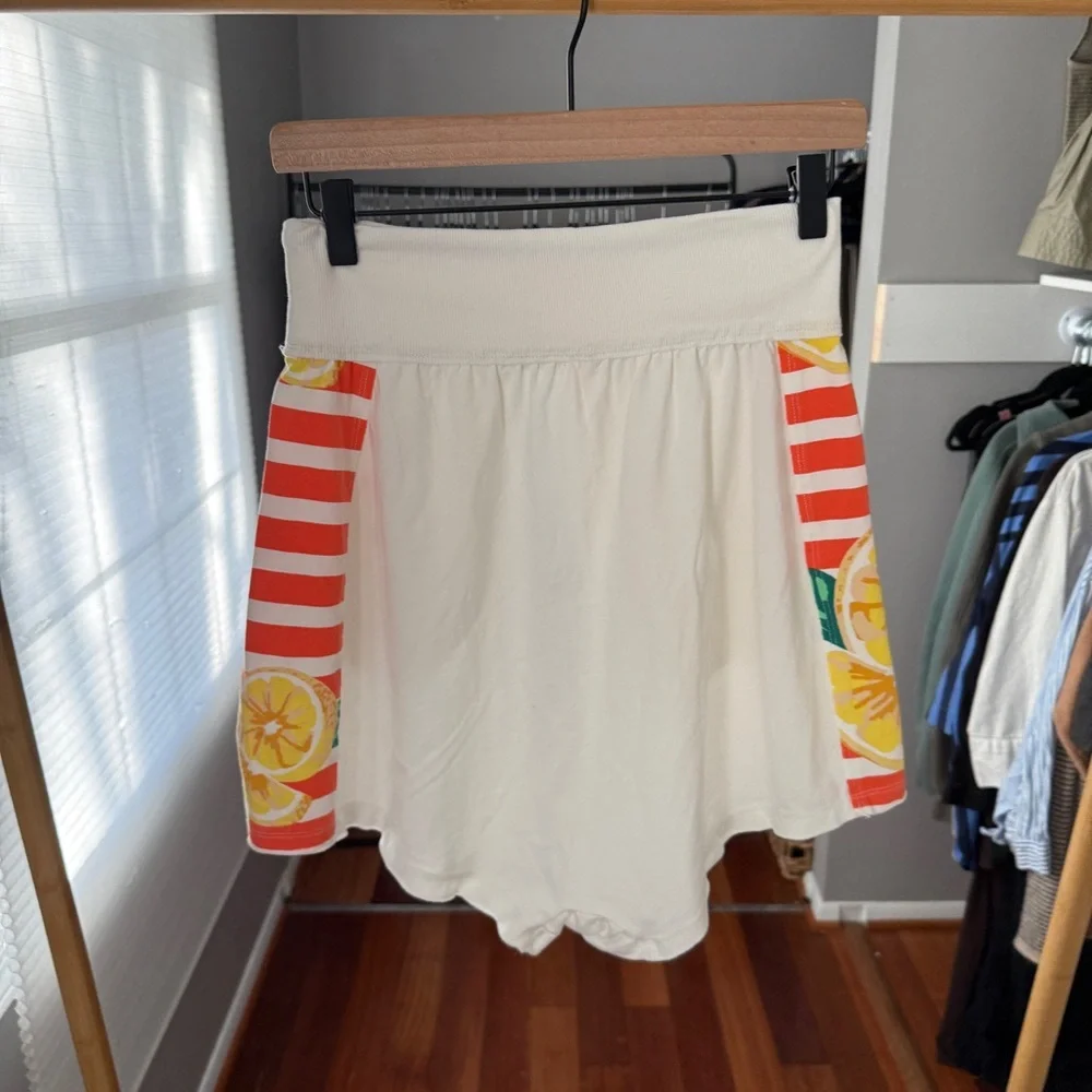 Free People White Tennis Shorts with Orange Stripe and Green Waistband